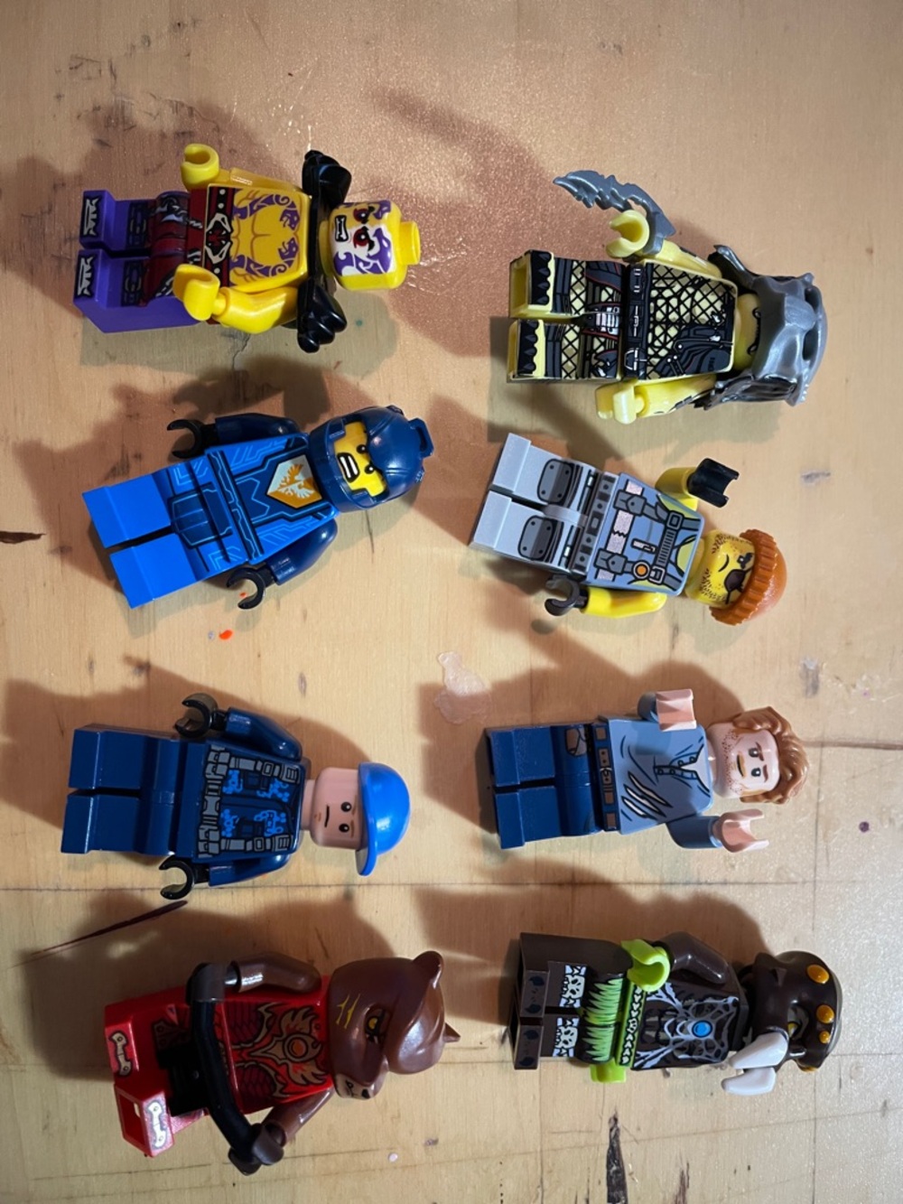 Lego Minifigure Lot with Blue, Yellow, Red, Purple, Brown, Gray Figures